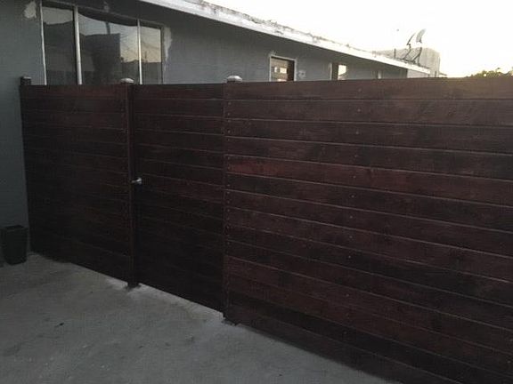 Gated entrance to back house