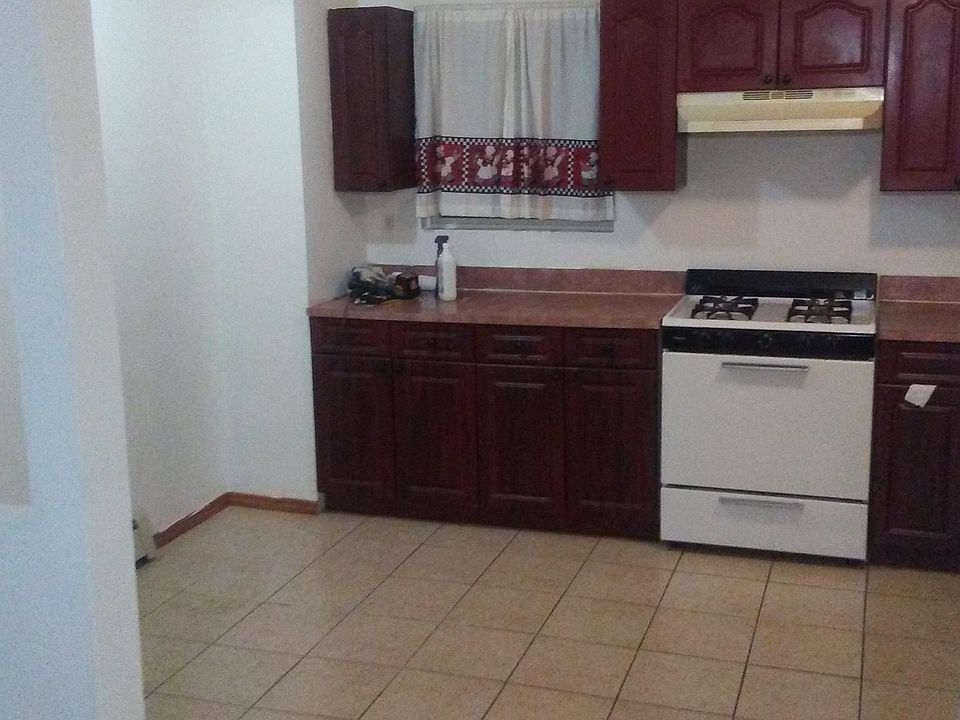 1st image of 1812 E 92nd St