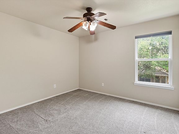 Bedroom 2 overlooking backyard