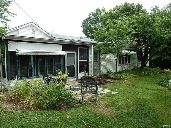 Glass enclosed porch.