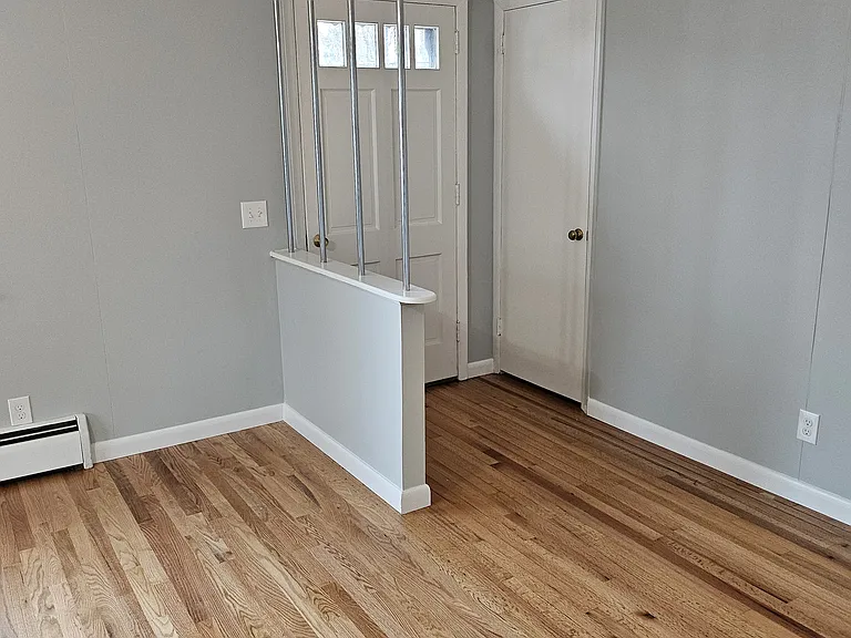 Entrance to living room (with more closets!)
