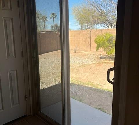 Sliding kitchen door to back yard.