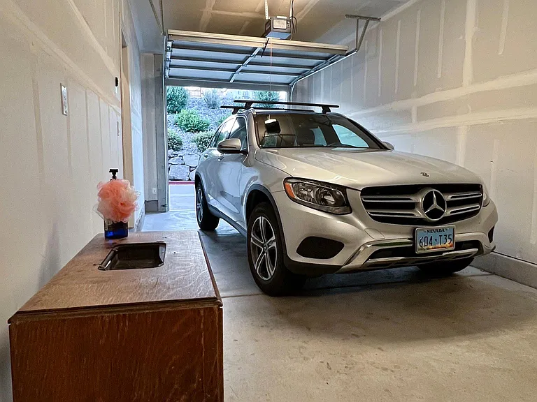 Tandem garage. Fits two cars one behind the other.