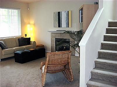 Gas fireplace, mantle with designer touches throughout.