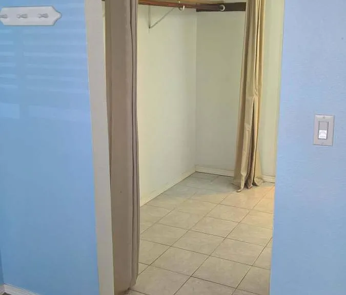 Walk-in closet off master bedroom
