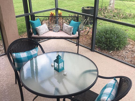 Lanai with fabulous golf course, lake and preserve view.