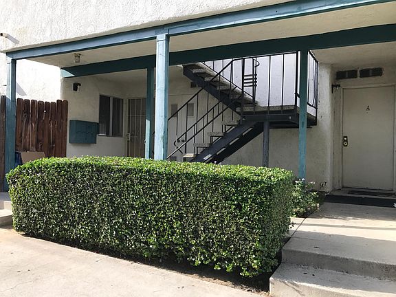 Downstairs apartment unit on left