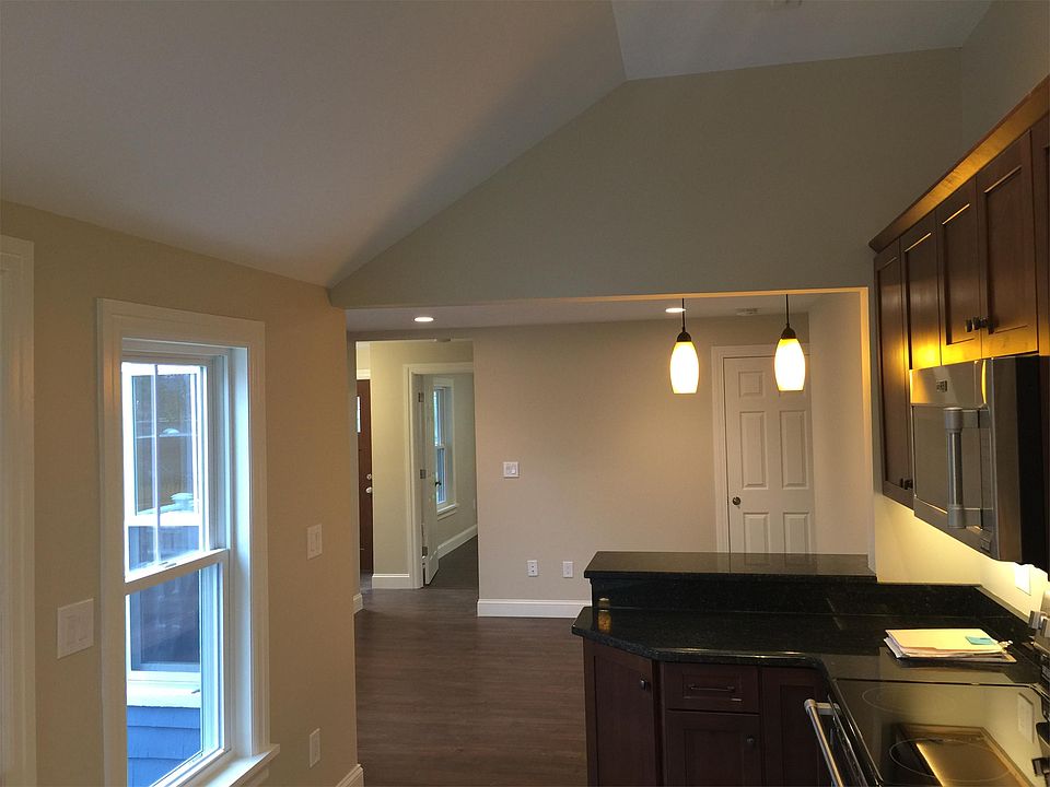 Kitchen opens up to living room