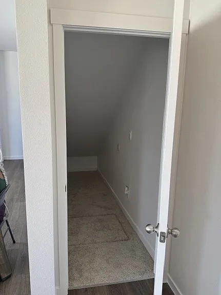 Extra storage and crawl space entry below the stairs. Very large crawl space with 6ft ceilings