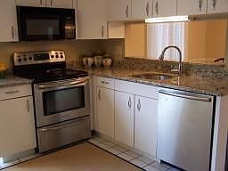 Kitchen - renovated kitchen with granite countertops and faucet