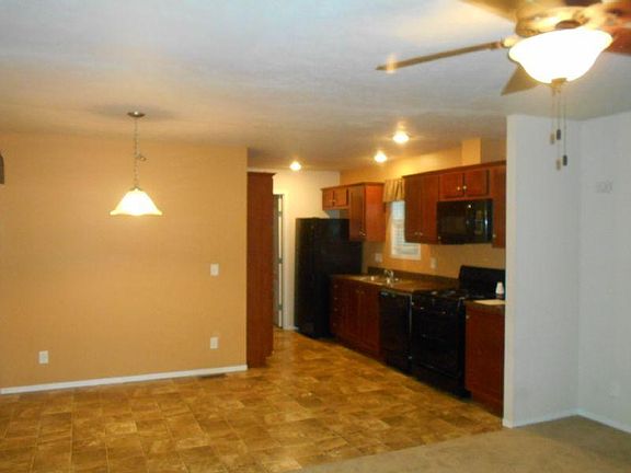 Lot 51 has an awesome kitchen and dining room that comes with all black appliances!