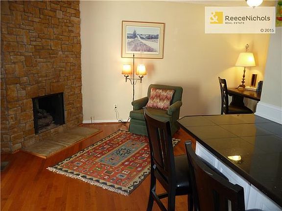 Hearth room opens to kitchen and offers hardwood floors plus flexible living space.