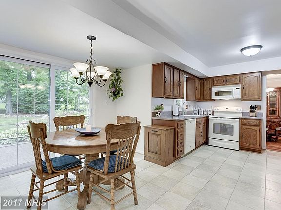 Immaculate Kitchen w/Sliding Glass Doors to Patio