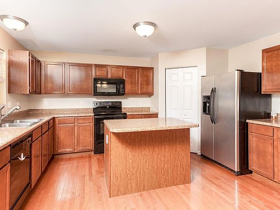 Kitchen with Built-in Island and Larger Pantry