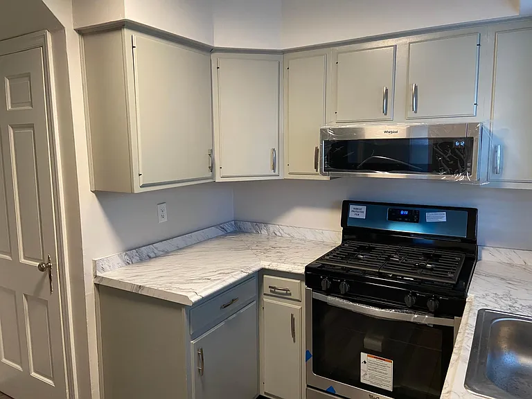 All new stainless appliances including low profile microwave