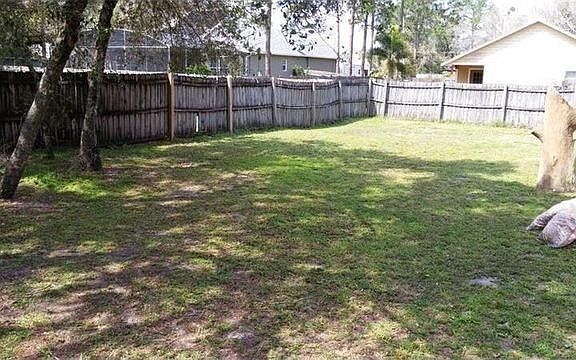 fenced back yard