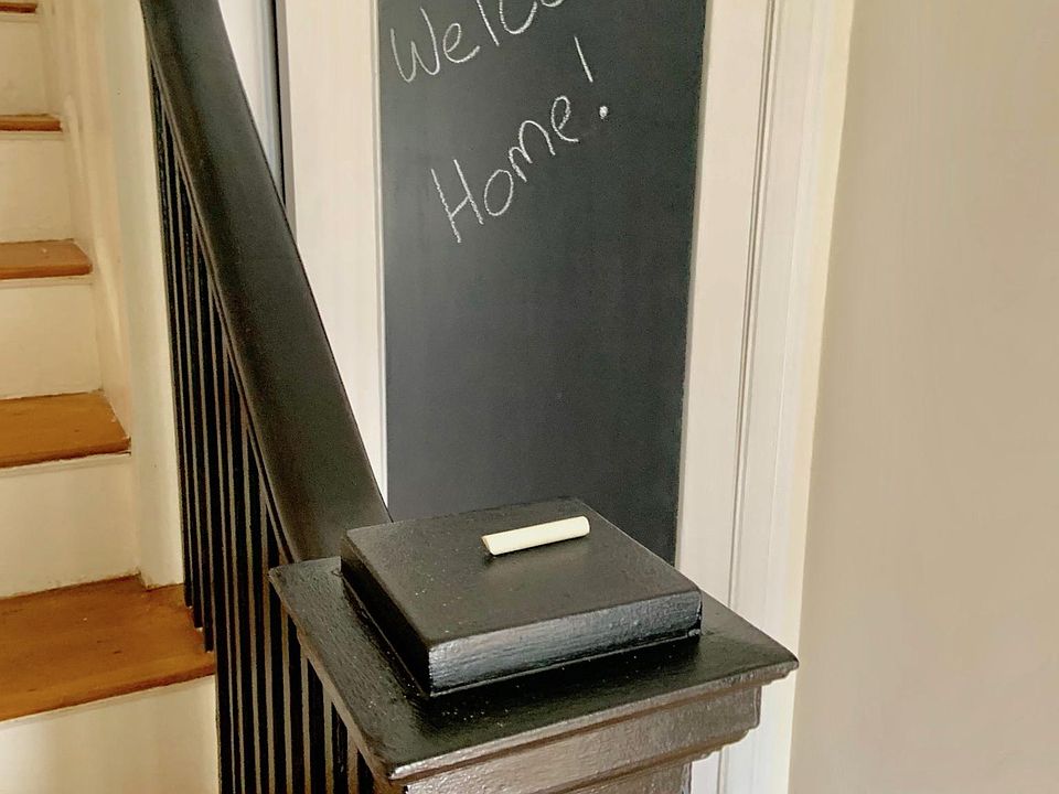 chalkboard closet in entrance hallway