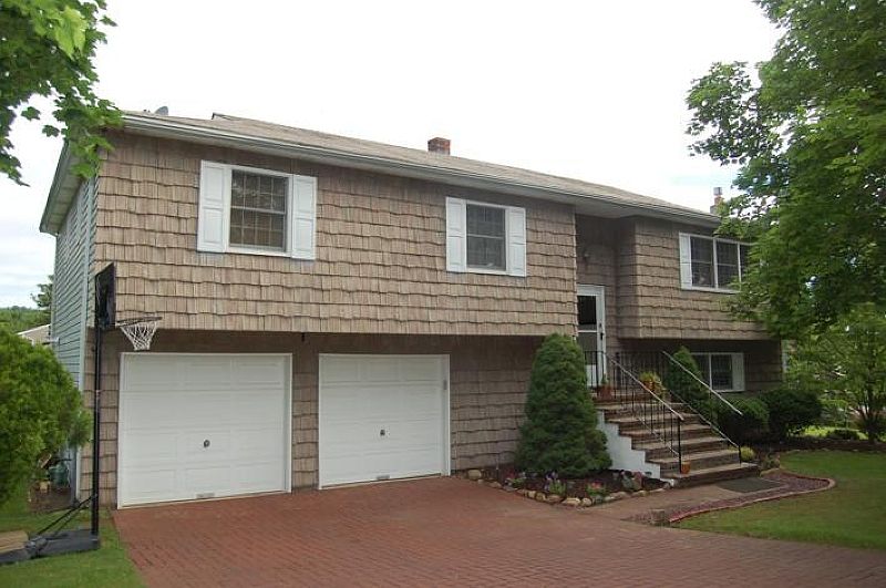 Front view with 2 car garages