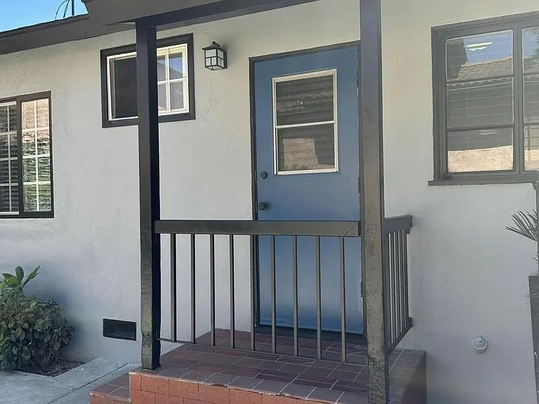 Side door from driveway into kitchen for easy access.