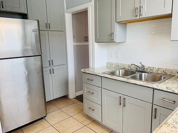 Kitchen with Stainless Steel Refrigerator