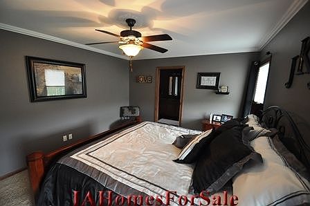 Master Bedroom newly painted with crown molding installed.