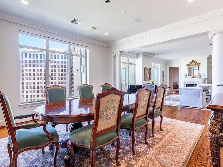 Large Dining Room flanked by columns.