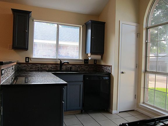 Kitchen with granite counters
