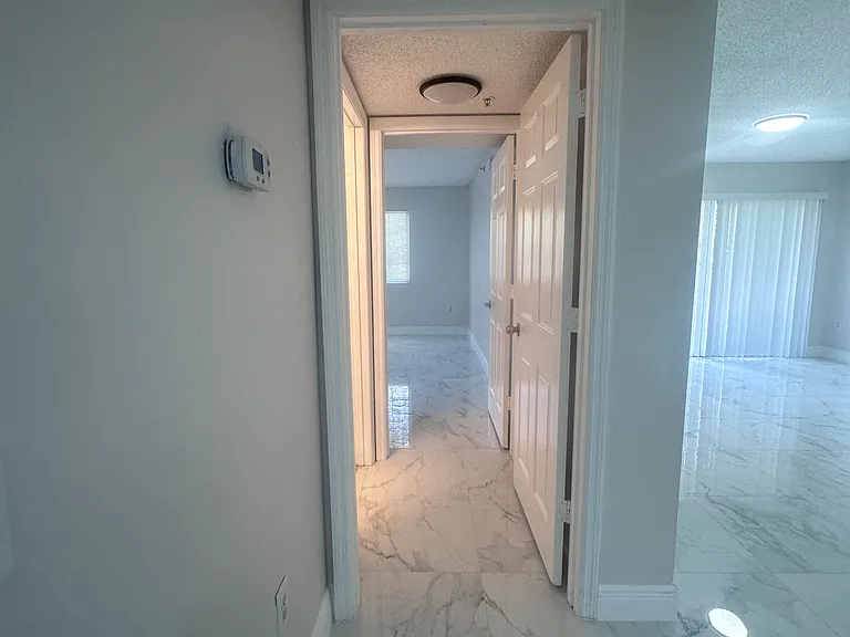 5011 Wiles Rd #207 — Photo 35