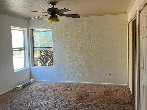 Master Bedroom, with large corner windows and lots of closet space.