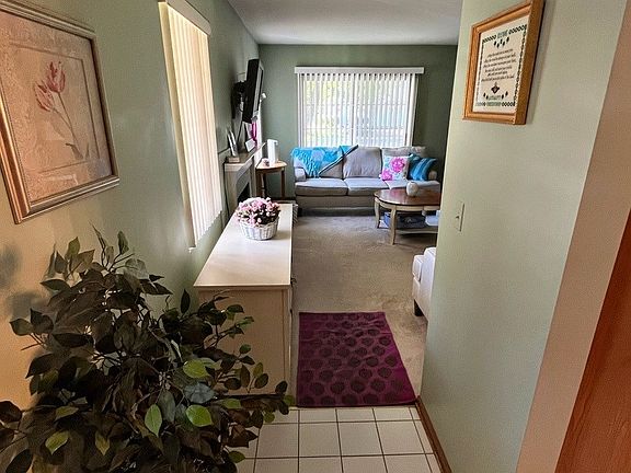 Ceramic floors entry to living room
