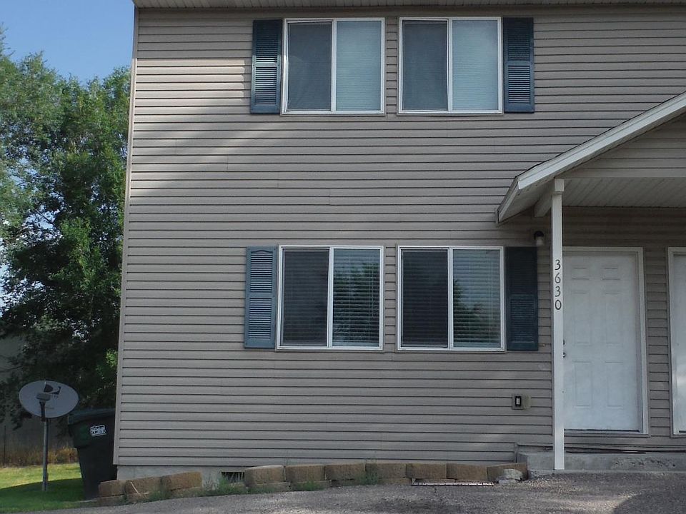 Front of unit, Master bedroom windows up and Living room windows and front door down