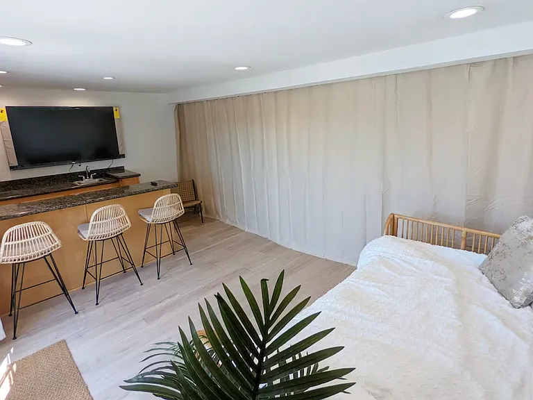 Loft: can be turned into a 3rd bedroom or guest room in seconds via built-in room curtains