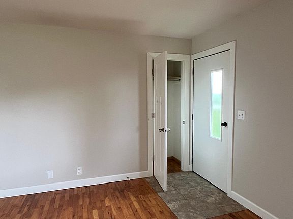 Front door and coat closet