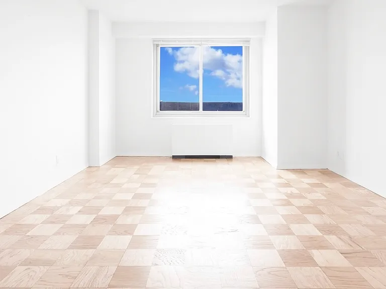 Elevate your lifestyle at The Century with this spacious, sunlit living area featuring expansive windows that invite natural light. Perfect for creating your dream home. Schedule a tour today to see it for yourself!