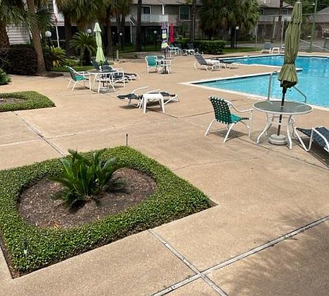 Pool area with clubhouse