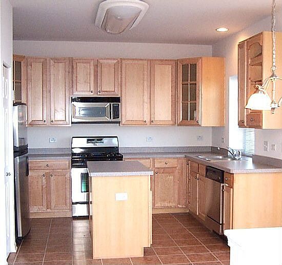 Maple cabs. SS appliances