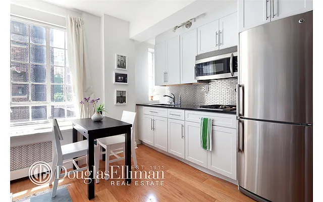 Sold by Douglas Elliman | media 7