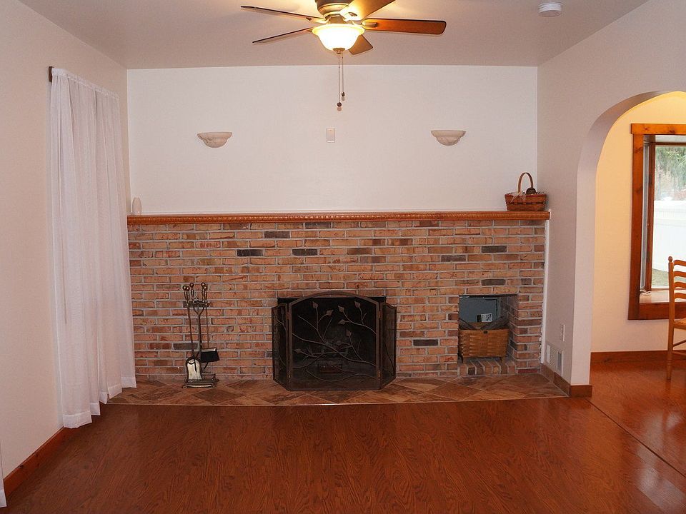 Living Room with Built-in Wood Burning Fireplace