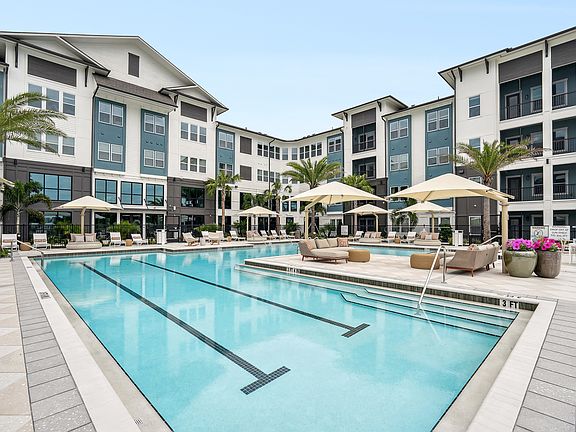 Resort-Style Pool with Sun Shelf and Grilling