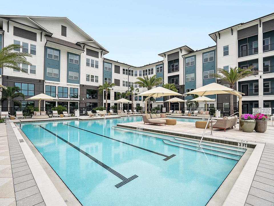 Resort-Style Pool with Sun Shelf and Grilling