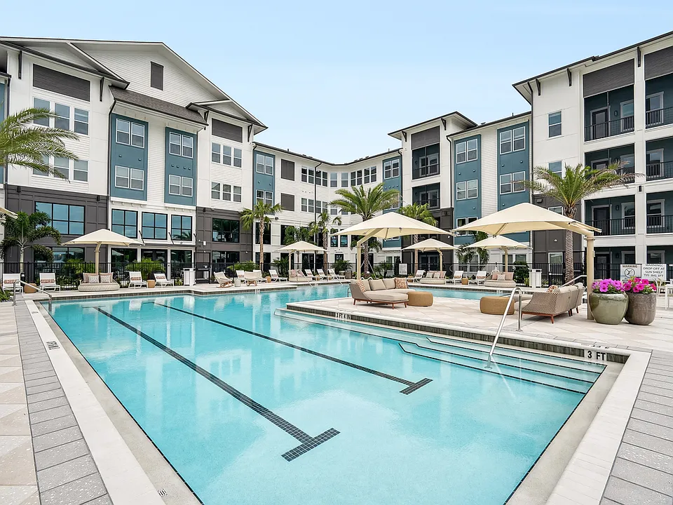 Resort-Style Pool with Sun Shelf and Grilling