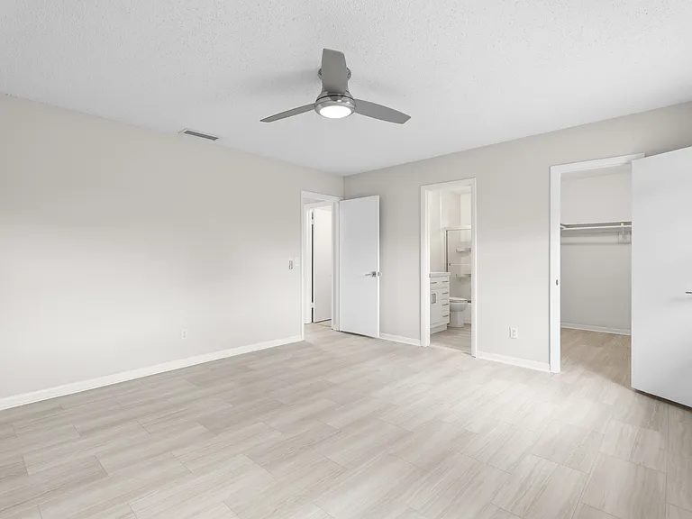 One of 2 primary bedrooms with private bath and walk-in closet