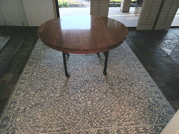dining room with 5 foot round solid cherry wood table