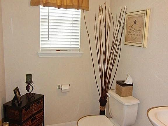 Powder Room Adjacent To  The Family Room