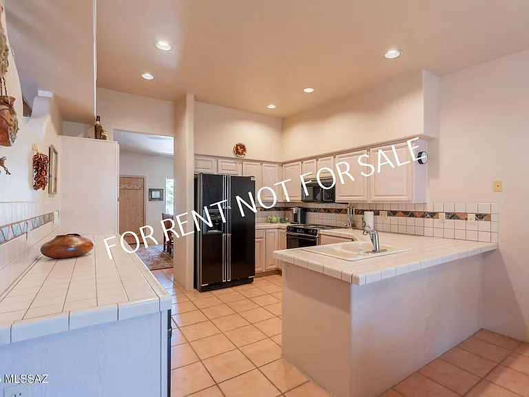 9876 N Ridge Shadow Pl — Photo 18