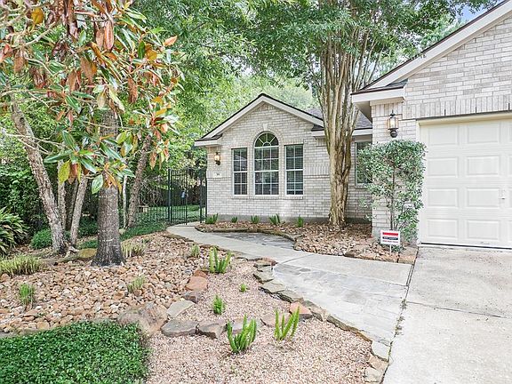 Through the wrought iron gate is the courtyard entry