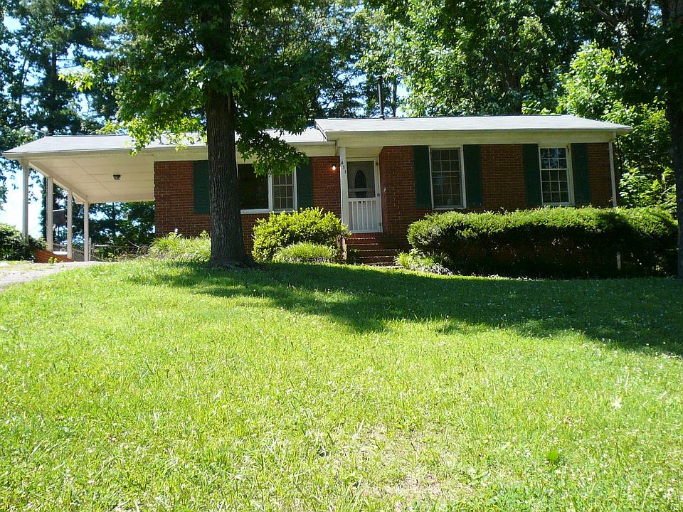 Carport and fenced in back yard