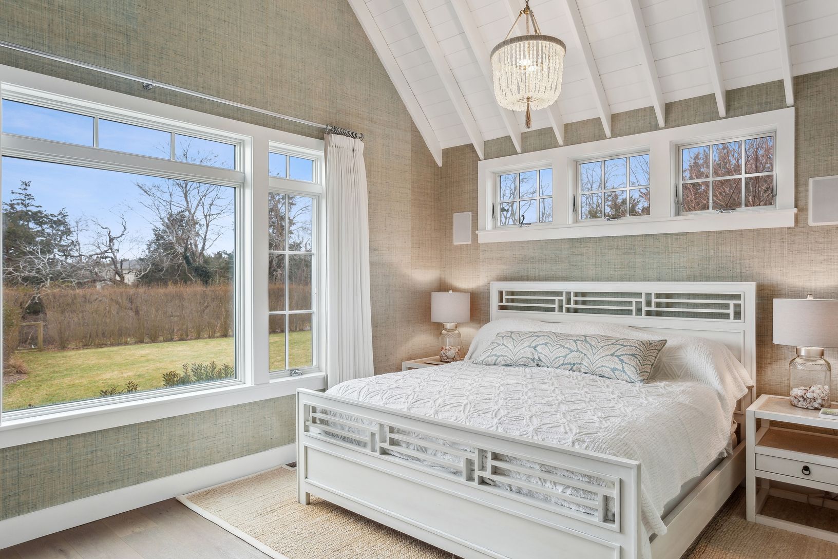  Primary bedroom with gorgeous views and en-suite bath  on main level.