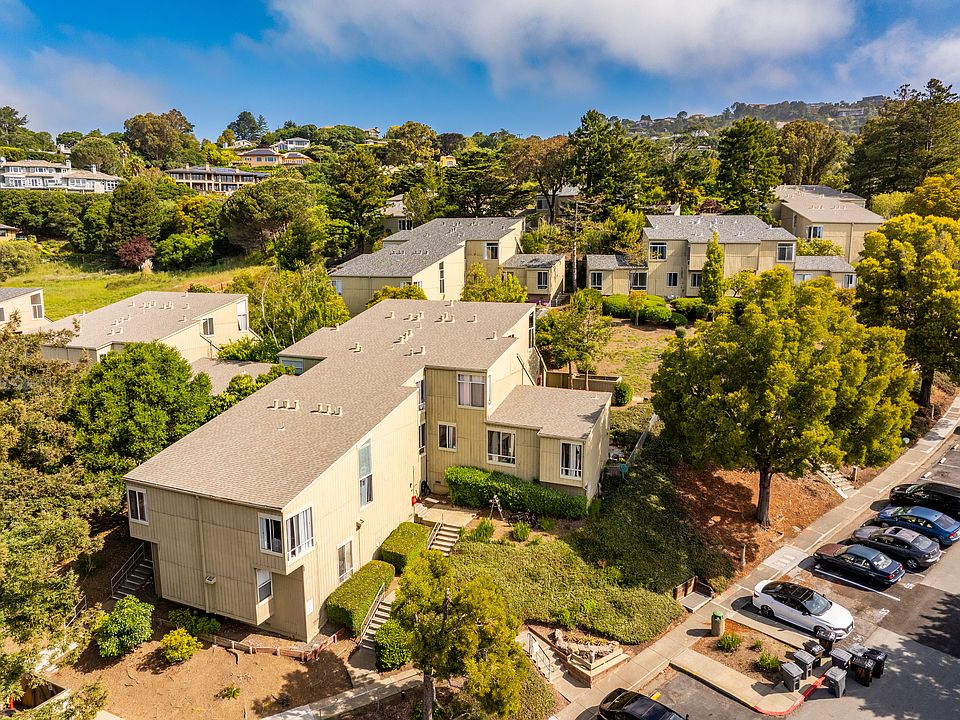 Surrounded by green space with ample parking.
