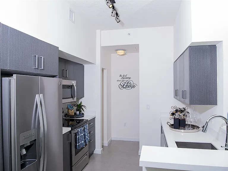 1 Bedroom Model Unit | Kitchen with Stainless Steel Appliances